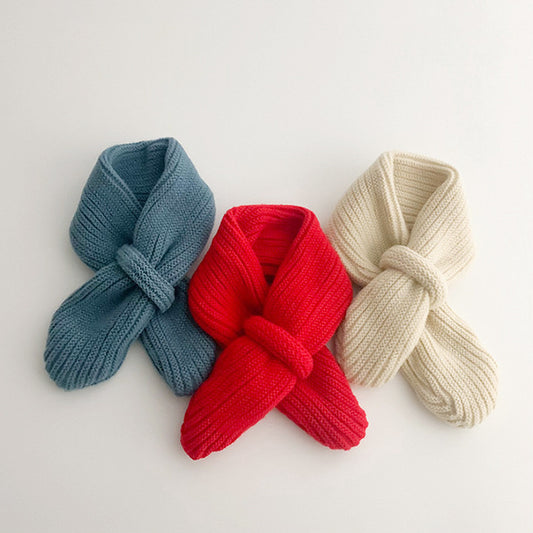 Boots for boys and girls. Knitted winter and autumn warm neckwear for infants and toddlers. Baby scarf and hat that goes well with everything.