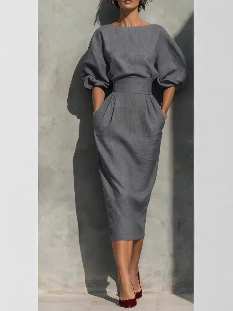 Spring/Summer style elegant boat-neck A-line skirt with puff sleeves top paired with high-waisted pleated half-skirt perfectly showcases retro style.