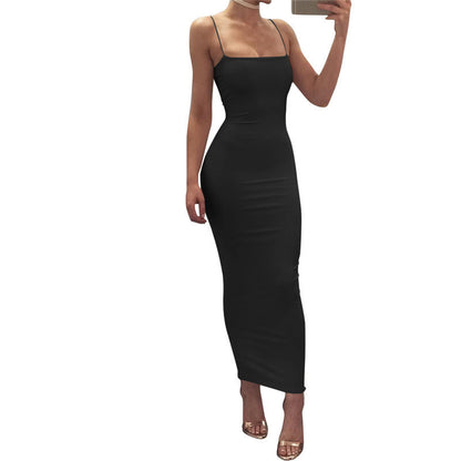 Women's sexy spaghetti strap long dress with backless design and slim fit, perfect for summer.