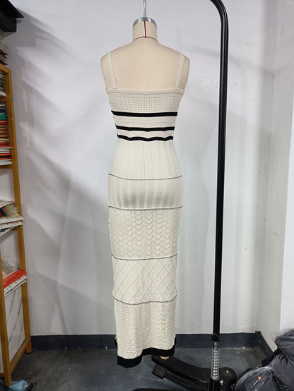 Women's halter top dress with a fitted and hourglass shape, showing off a slim figure. A mid-length, slit, fishtail-style dress. A feminine, bold look for women.