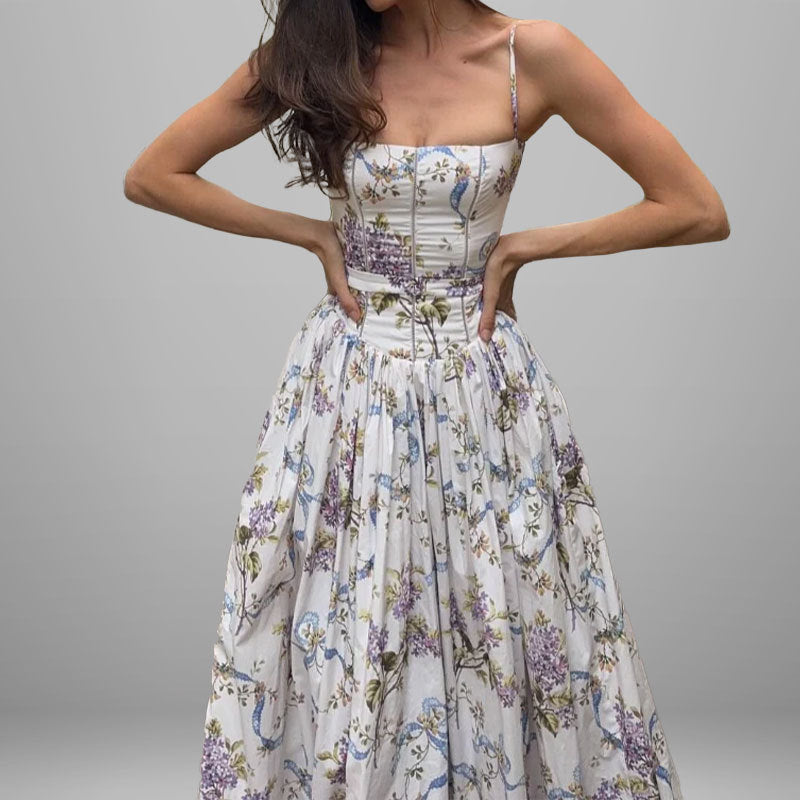 Women's dress: Long dress with elegant print, wide hem, and strapless design.