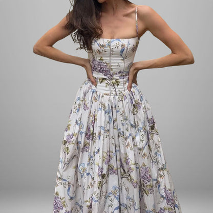 Women's dress: Long dress with elegant print, wide hem, and strapless design.