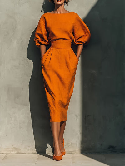 Spring/Summer style elegant boat-neck A-line skirt with puff sleeves top paired with high-waisted pleated half-skirt perfectly showcases retro style.