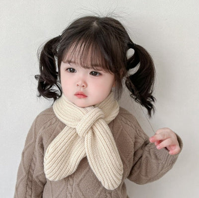 Boots for boys and girls. Knitted winter and autumn warm neckwear for infants and toddlers. Baby scarf and hat that goes well with everything.