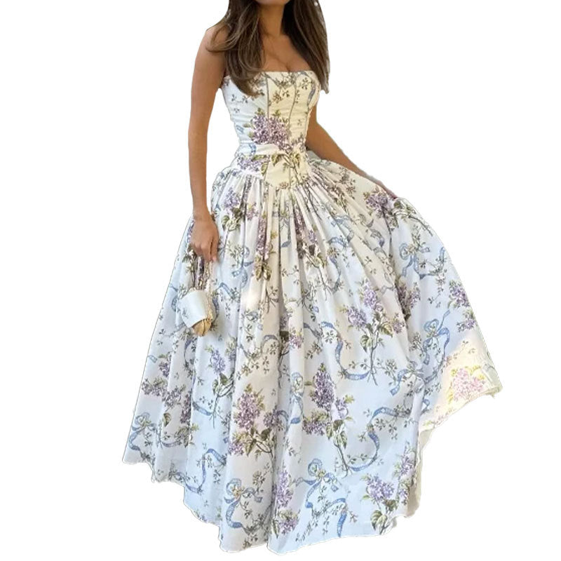 Women's dress: Long dress with elegant print, wide hem, and strapless design.
