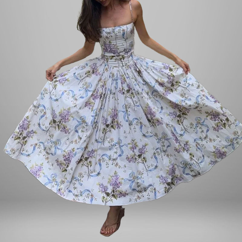Women's dress: Long dress with elegant print, wide hem, and strapless design.